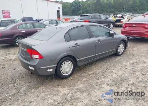 2010 Honda Civic Hybrid from USA, damaged, VIN JHMFA3F2XAS003400